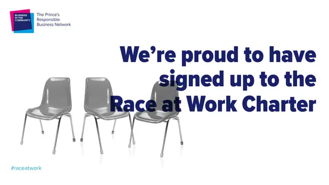 Three empty chairs and text announcing the signing of the Race at Work Charter.